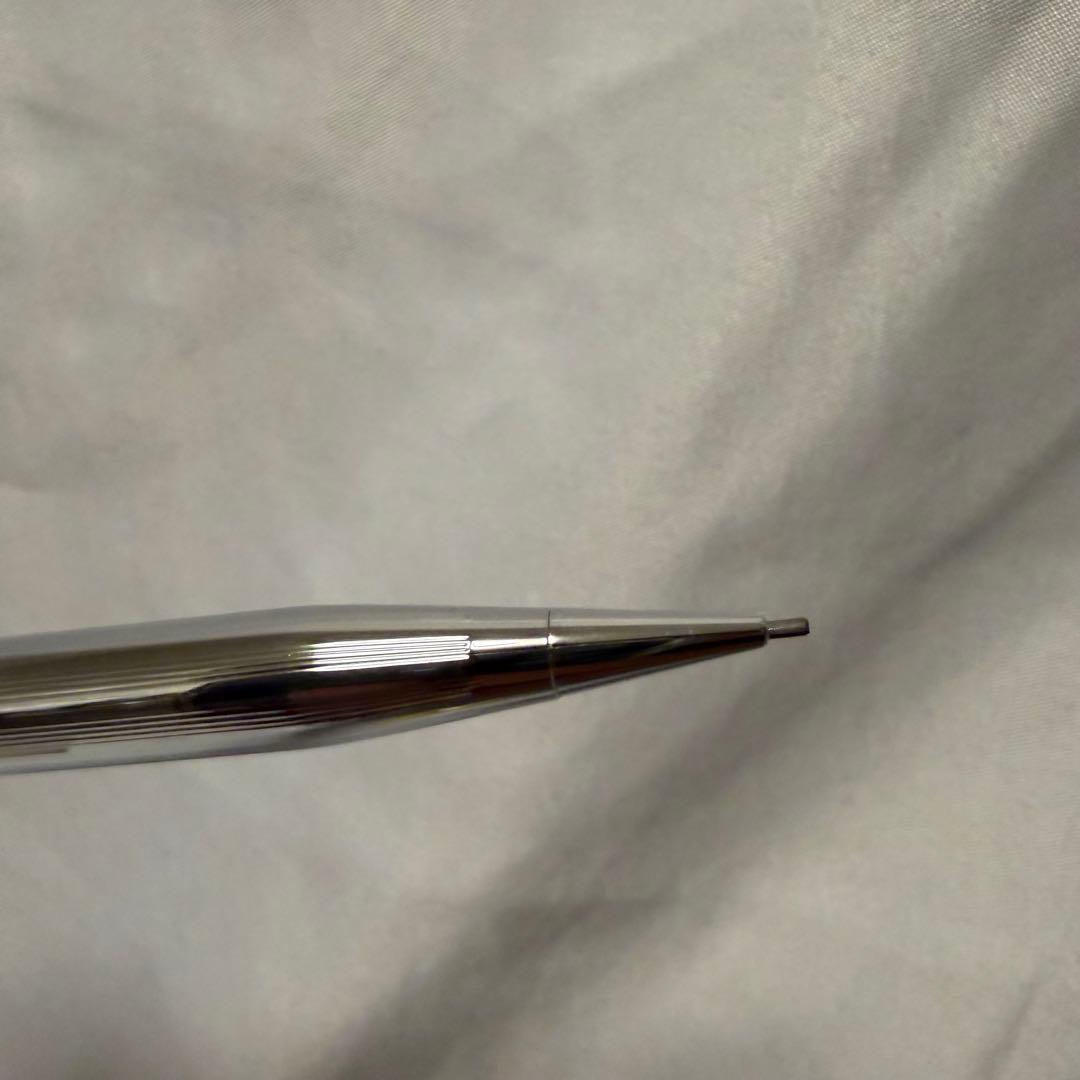 Used Cross pencil with silver body showing good condition