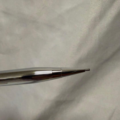 Used Cross pencil with silver body showing good condition