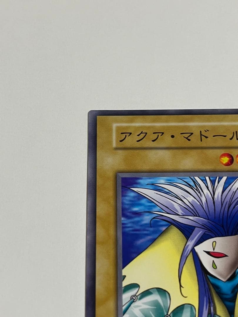 Multiple Yu-Gi-Oh! Aqua Madame initial set trading cards from Japan import displayed on a flat surface