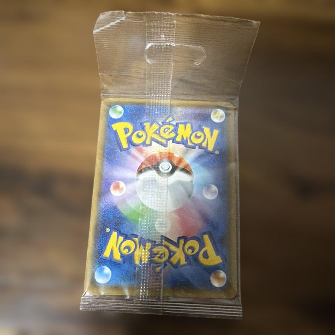Bandai Eevee Poncho Promo 141/SM-P unopened card from Japan with Eevee holo card inside