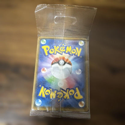 Bandai Eevee Poncho Promo 141/SM-P unopened card from Japan with Eevee holo card inside