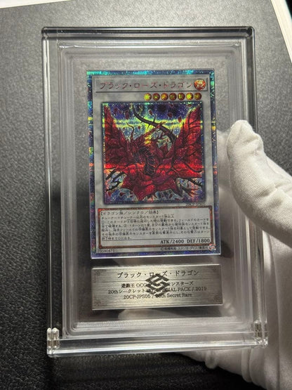 Yugioh Black Rose Dragon 20th ARS10+ card with acrylic case showing front and box with scratches