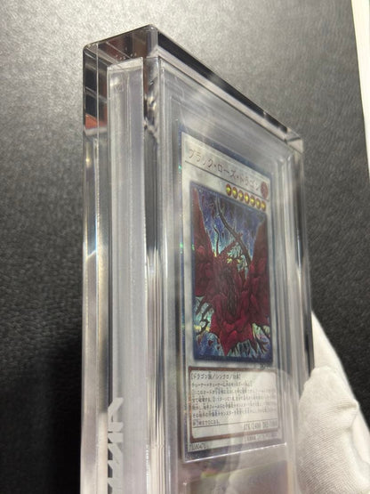 Yugioh Black Rose Dragon 20th ARS10+ card with acrylic case showing front and box with scratches