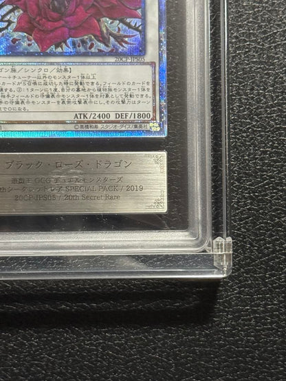 Yugioh Black Rose Dragon 20th ARS10+ card with acrylic case showing front and box with scratches
