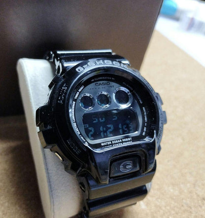 Casio G-Shock DW-6900NB Watch with Silver Dial and Black Band Japan Import