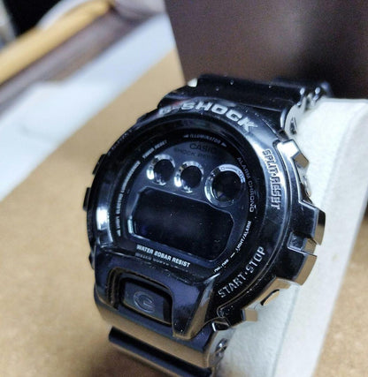 Casio G-Shock DW-6900NB Watch with Silver Dial and Black Band Japan Import
