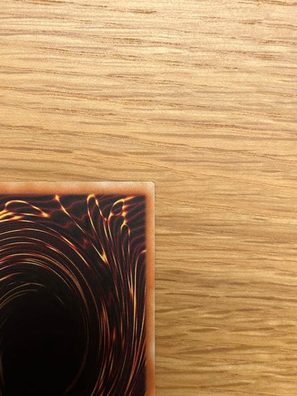 Yu-Gi-Oh Sapphire Dragon 1st edition Asia Ultra MFC trading card with visible initial scratches