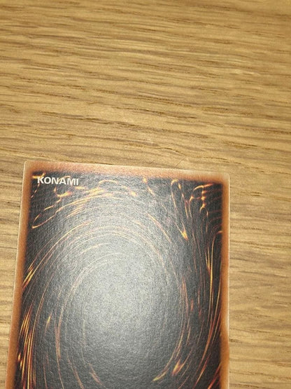 Yu-Gi-Oh Sapphire Dragon 1st edition Asia Ultra MFC trading card with visible initial scratches