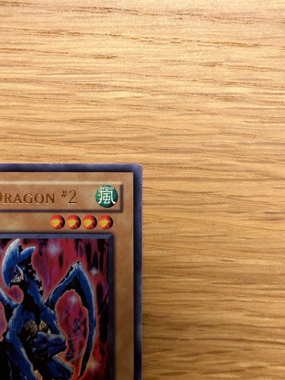 Yu-Gi-Oh Sapphire Dragon 1st edition Asia Ultra MFC trading card with visible initial scratches