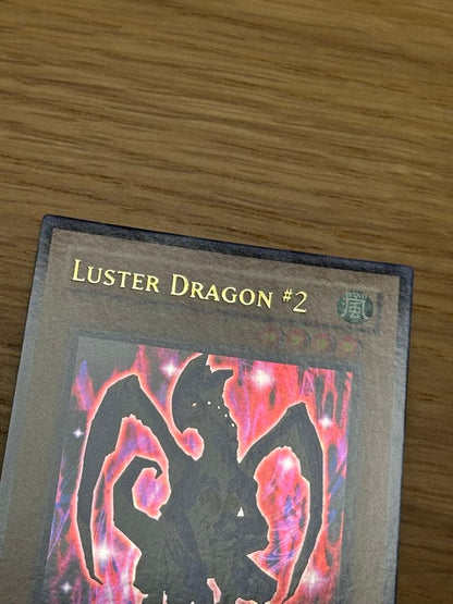 Yu-Gi-Oh Sapphire Dragon 1st edition Asia Ultra MFC trading card with visible initial scratches