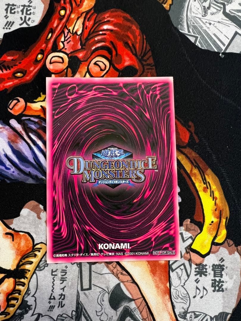 Yu-Gi-Oh Dungeon Dice Monsters Black Magician Girl card pink background Ultimate Rare with gold text