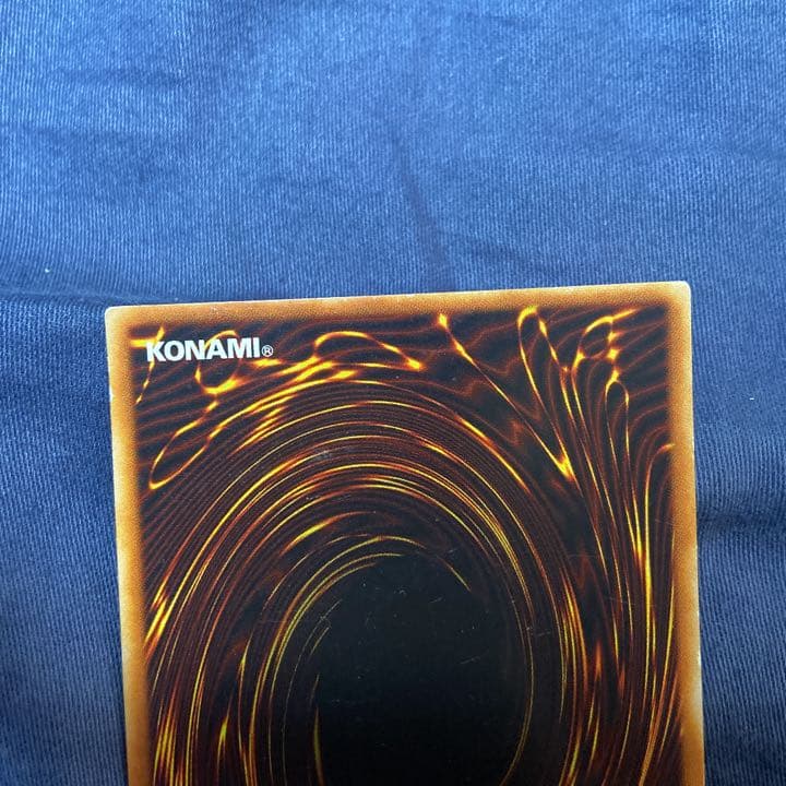 Konami Ultimate Great Mosus Chaos Soldier Red-Eyes Black Dragon trading card in protective sleeve and packaging