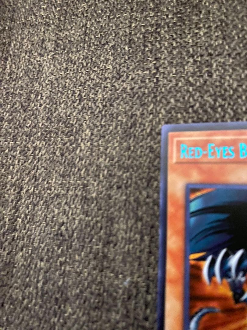 Seiko Red Eyes Black Metal Dragon 25th Anniversary English Blue collectible card with red, black, and blue colors