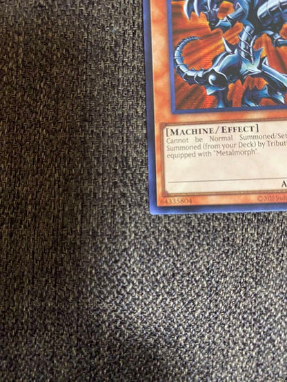 Seiko Red Eyes Black Metal Dragon 25th Anniversary English Blue collectible card with red, black, and blue colors