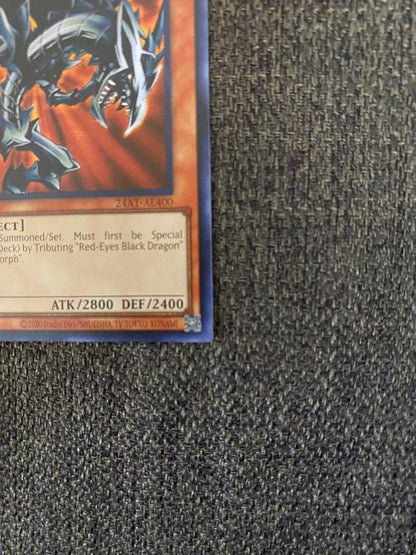 Seiko Red Eyes Black Metal Dragon 25th Anniversary English Blue collectible card with red, black, and blue colors