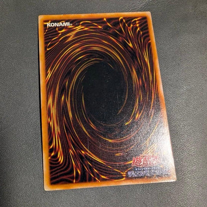 Yu-Gi-Oh Holy Night Dragon Secret Rare Japanese trading card showing signs of wear and scratches