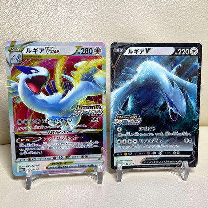 Bandai Lugia VSTAR 325 and Lugia V 324 Pokemon promo cards in good condition with no noticeable scratches