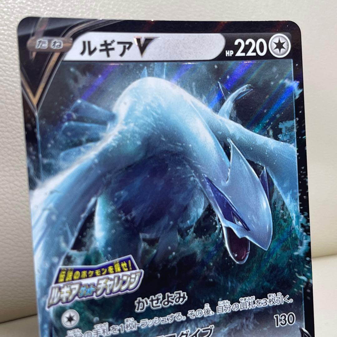 Bandai Lugia VSTAR 325 and Lugia V 324 Pokemon promo cards in good condition with no noticeable scratches