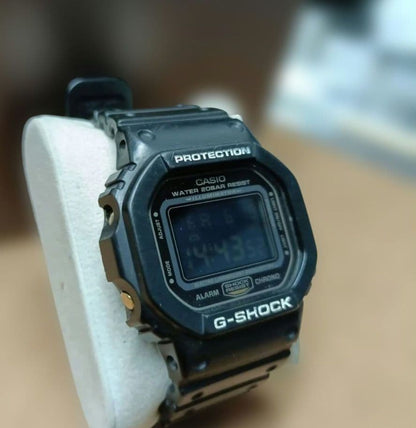Casio G-Shock Speed Model DW-5600P Watch with Black Case and Reversed LCD Gold Text — Japan Import