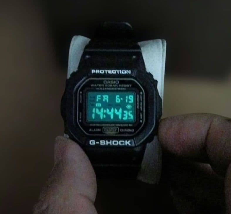 Casio G-Shock Speed Model DW-5600P Watch with Black Case and Reversed LCD Gold Text — Japan Import