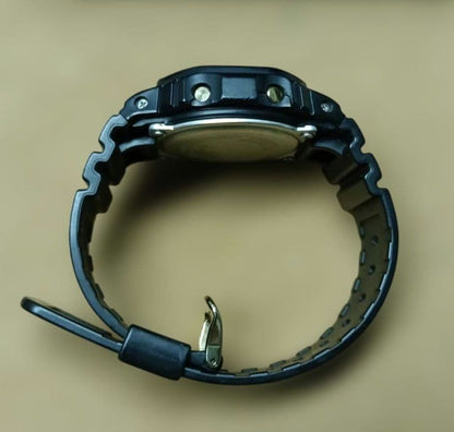 Casio G-Shock Speed Model DW-5600P Watch with Black Case and Reversed LCD Gold Text — Japan Import