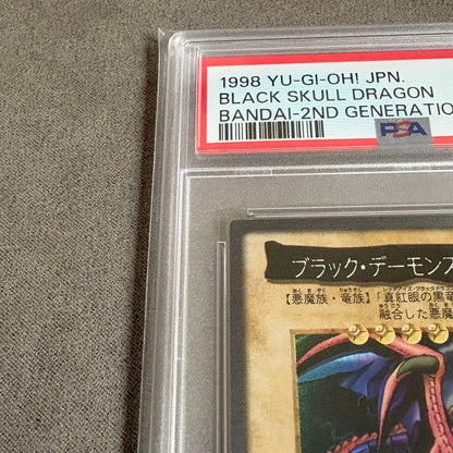 Bandai Yu-Gi-Oh Black Demons Dragon card graded PSA9, Japan import, in mint condition