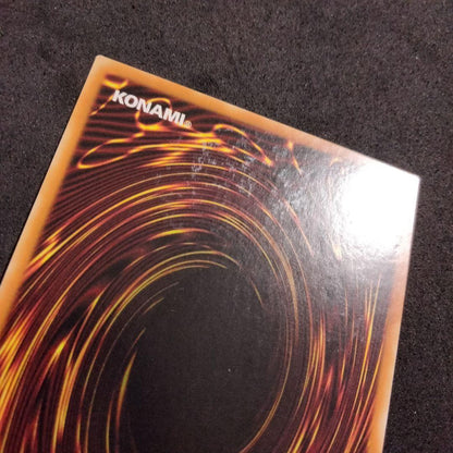 Yugioh Red-Eyes Black Dragon English Ghost Rare Foil card with image shifted lower left and white fog mark on back
