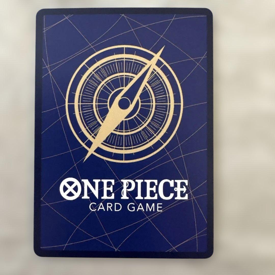 One Piece Portgas D Ace SP trading card from Japan with visible white scratches on the surface