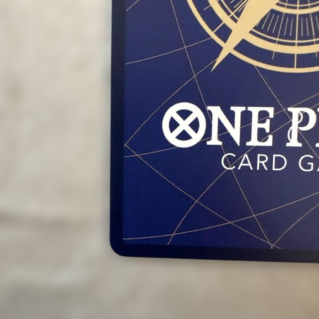 One Piece Portgas D Ace SP trading card from Japan with visible white scratches on the surface