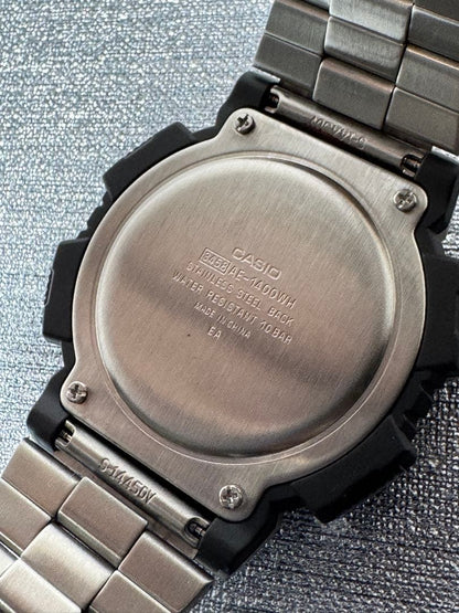 Casio Standard World Map Display Men’s Watch Model AE-1400WHD Metal Band Overseas Version — Japan Import