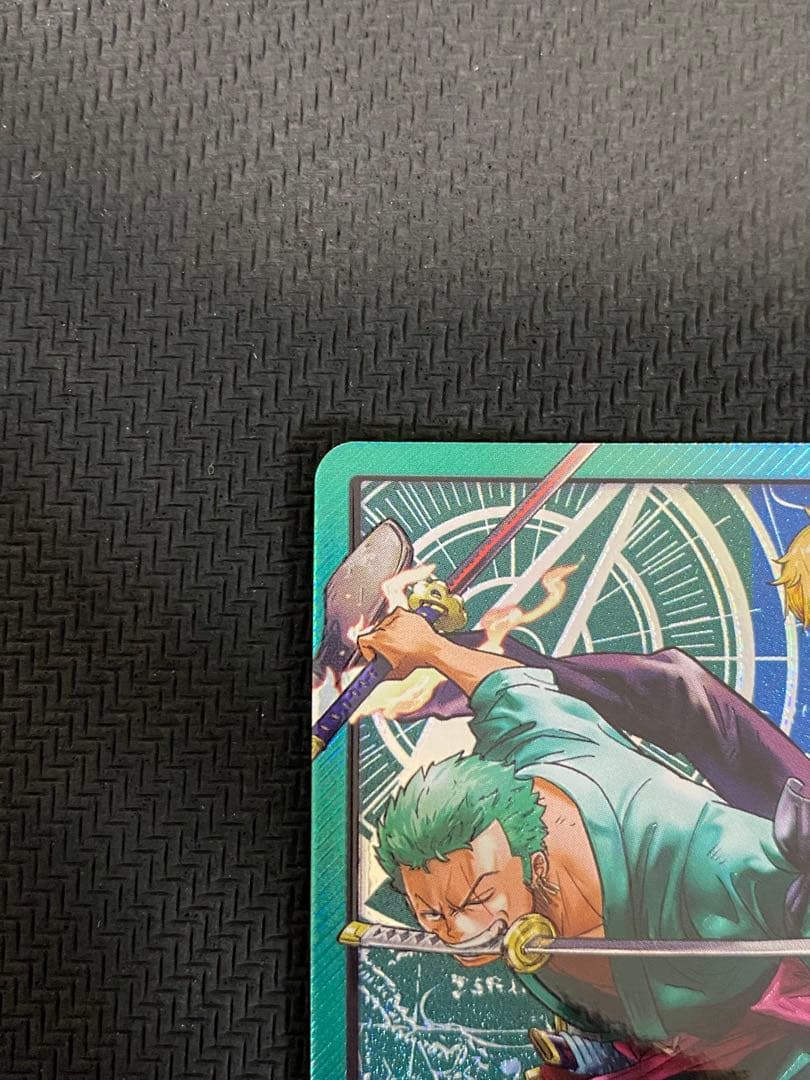One Piece trading cards featuring Monkey D. Luffy ST14-001 and Zoro & Sanji ST12-001 pirate crew from Japan