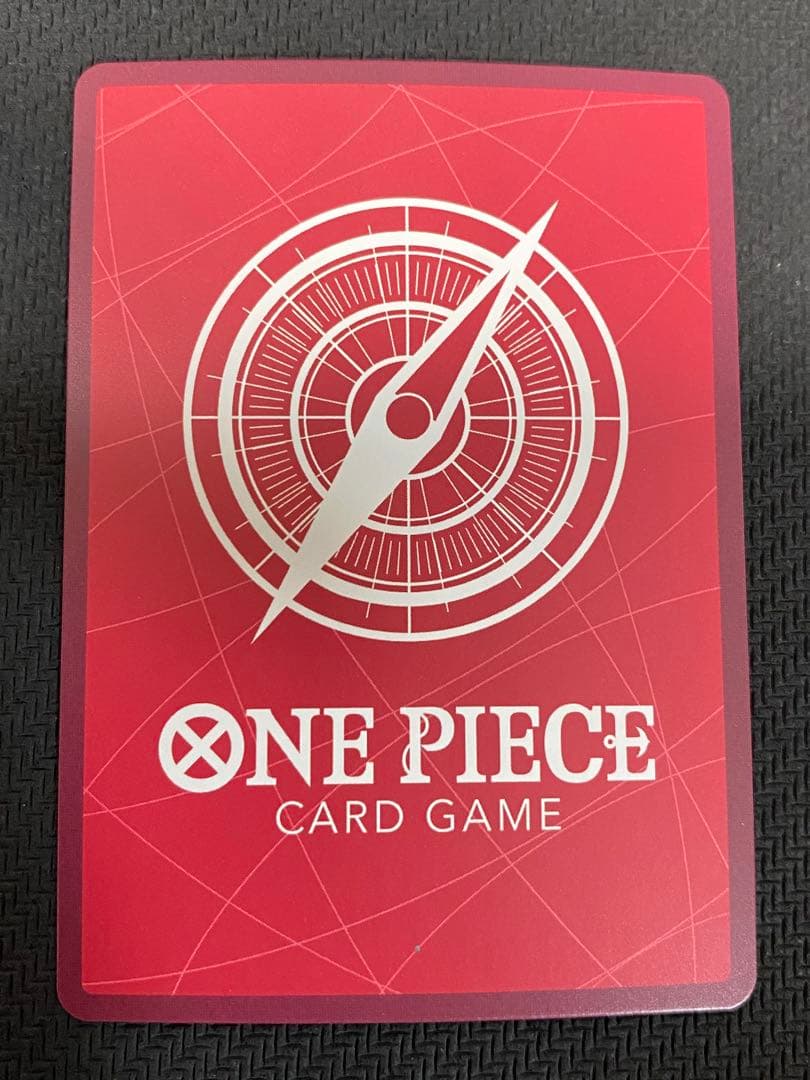 One Piece trading cards featuring Monkey D. Luffy ST14-001 and Zoro & Sanji ST12-001 pirate crew from Japan