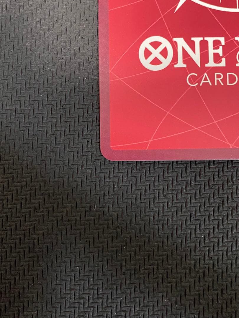 One Piece trading cards featuring Monkey D. Luffy ST14-001 and Zoro & Sanji ST12-001 pirate crew from Japan