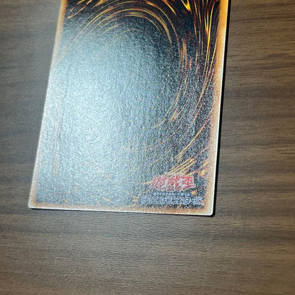 Yugioh Blue-Eyes Ultimate Dragon Secret Card in sleeves, showing front design with no visible damage