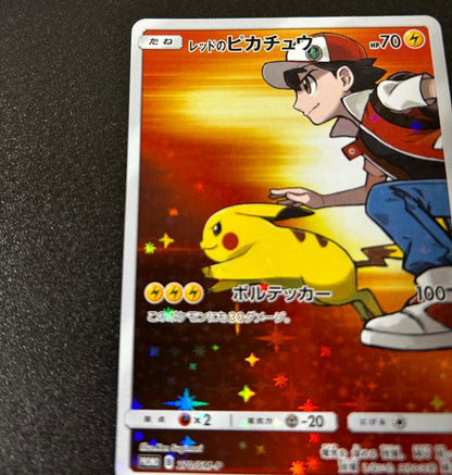 Bandai Red Pikachu figure from Pokémon Center 20th Anniversary Promotion in Japanese edition stored in protective sleeve