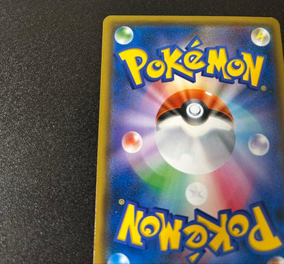 Bandai Red Pikachu figure from Pokémon Center 20th Anniversary Promotion in Japanese edition stored in protective sleeve