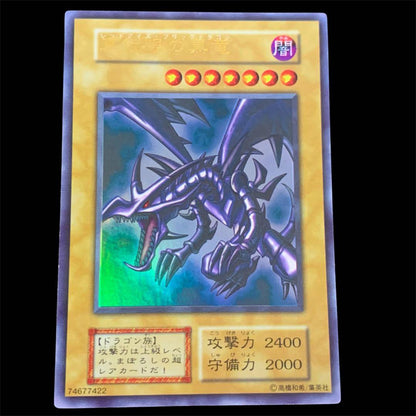 Used Yugioh Red-Eyes Black Dragon Ultra Rare card from initial Japanese set with good centering and condition
