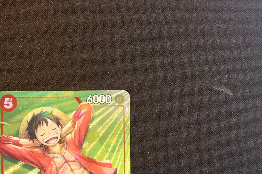 One Piece Monkey D. Luffy P-SR trading card ST21-014 in red color, Japanese edition, stored in protective sleeves