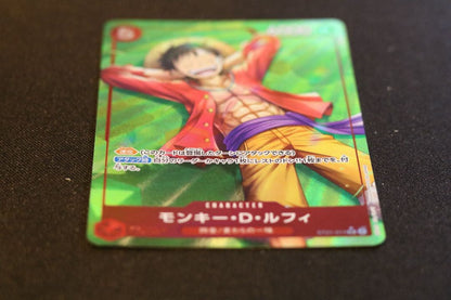 One Piece Monkey D. Luffy P-SR trading card ST21-014 in red color, Japanese edition, stored in protective sleeves