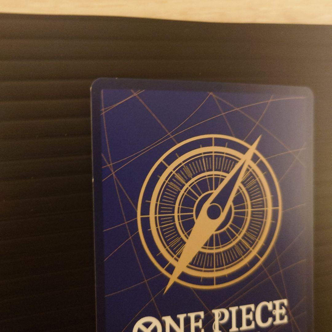 One Piece Riot Louma P-072 promo card from Japan wrapped in protective sleeves and cardboard packaging