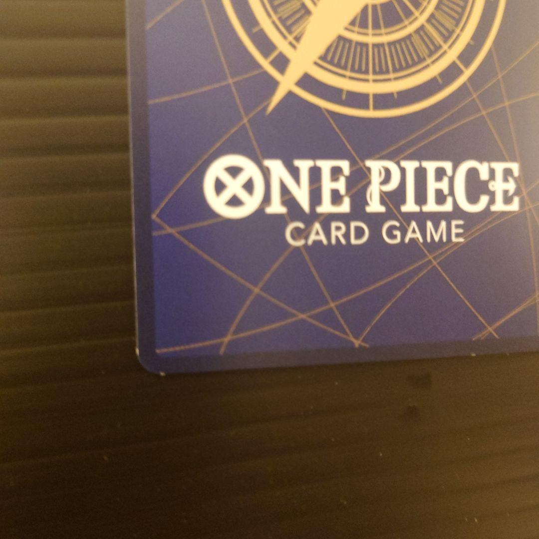 One Piece Riot Louma P-072 promo card from Japan wrapped in protective sleeves and cardboard packaging