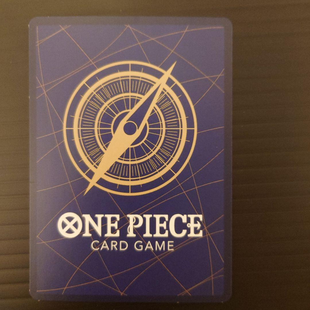 One Piece Riot Louma P-072 promo card from Japan wrapped in protective sleeves and cardboard packaging