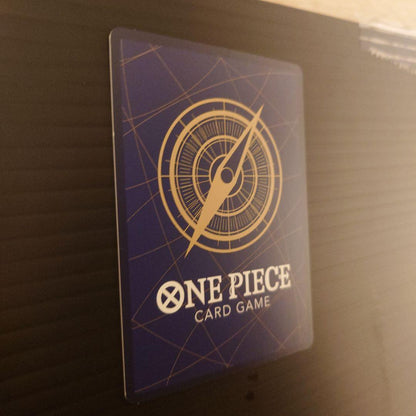 One Piece Riot Louma P-072 promo card from Japan wrapped in protective sleeves and cardboard packaging