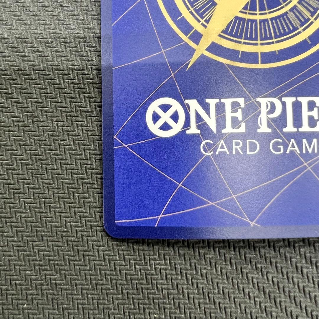One Piece OP13 Kenpachi R Parallel event card with foil embossing in protective hard case