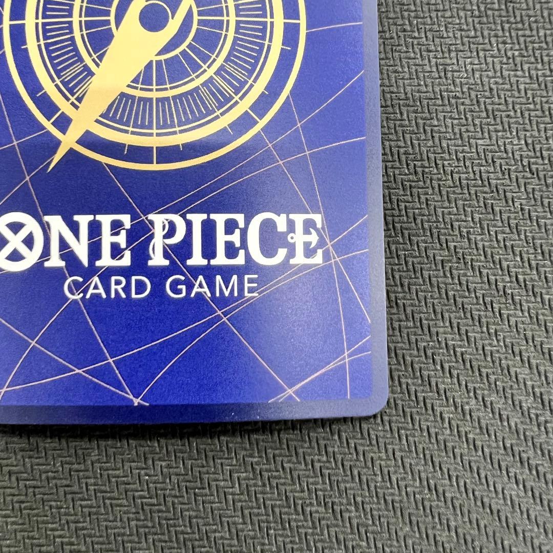 One Piece OP13 Kenpachi R Parallel event card with foil embossing in protective hard case