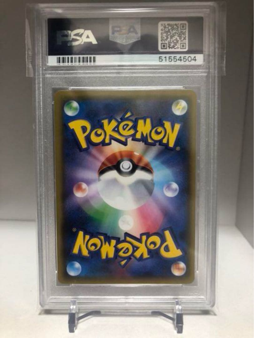 Pokemon Espeon GX trading card with PSA 10 grade and variant color