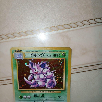 Pokemon NiDOKING First Expansion Pack single card from Japan in good unused condition with minor wear