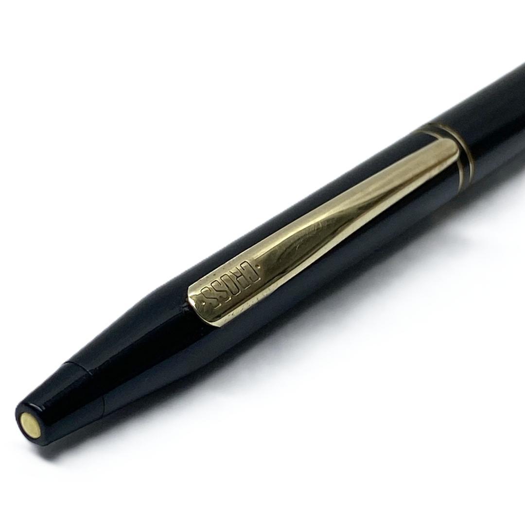 Cross Slim black ballpoint pen with twist mechanism and black ink, showing slight wear