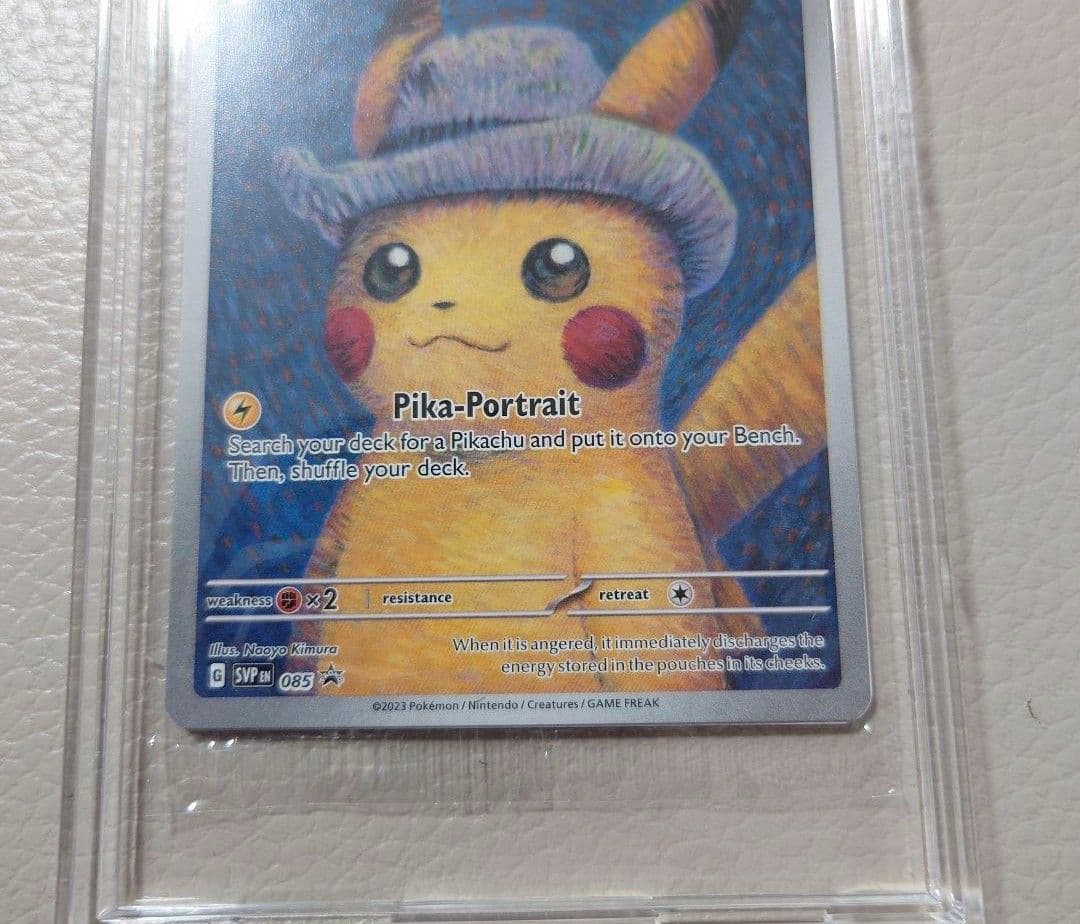 Bandai Pikachu promotional card SVP 085 with grey felt hat displayed in a dedicated frame