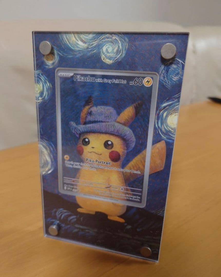 Bandai Pikachu promotional card SVP 085 with grey felt hat displayed in a dedicated frame